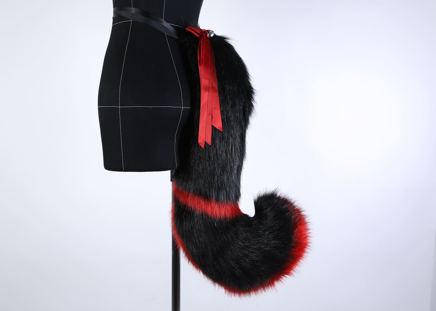 BLACK AND RED PUPPY tail